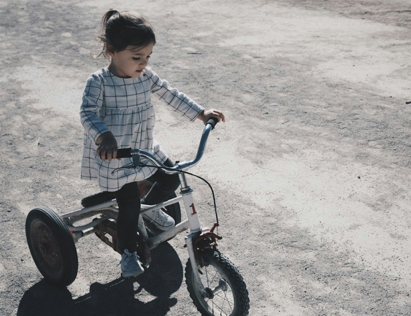 kid riding a bike