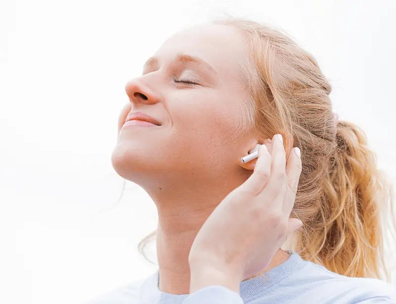 woman wearing earphones