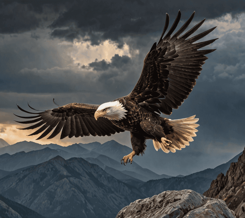 A determined eagle flying against a stormy mountainous backdrop