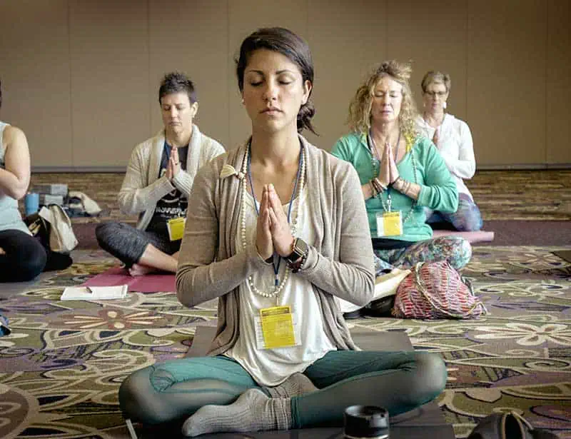 Group of people practicing yoga