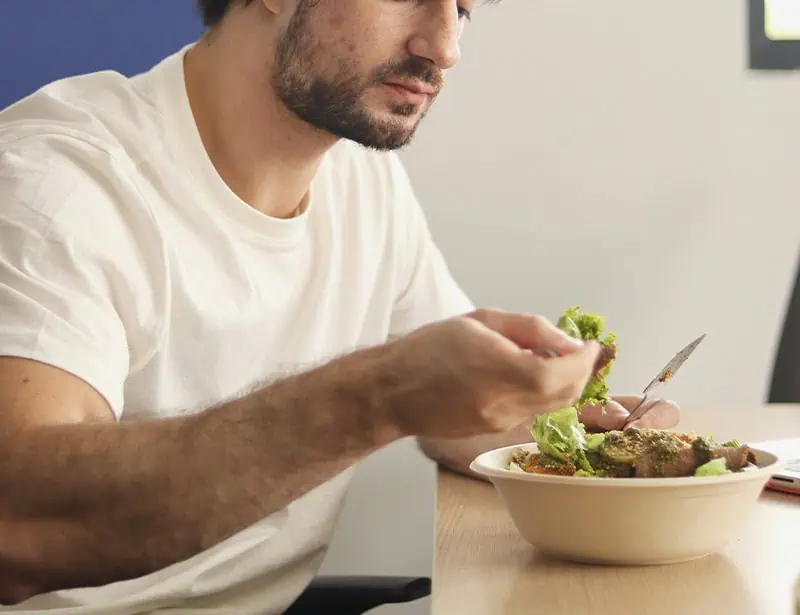 man eating healthy salad