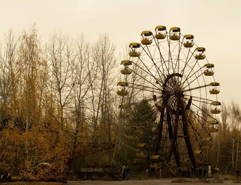 yellow ferris wheel in Pripyat Ukraine built but never used due to Chernobyl nuclear disaster