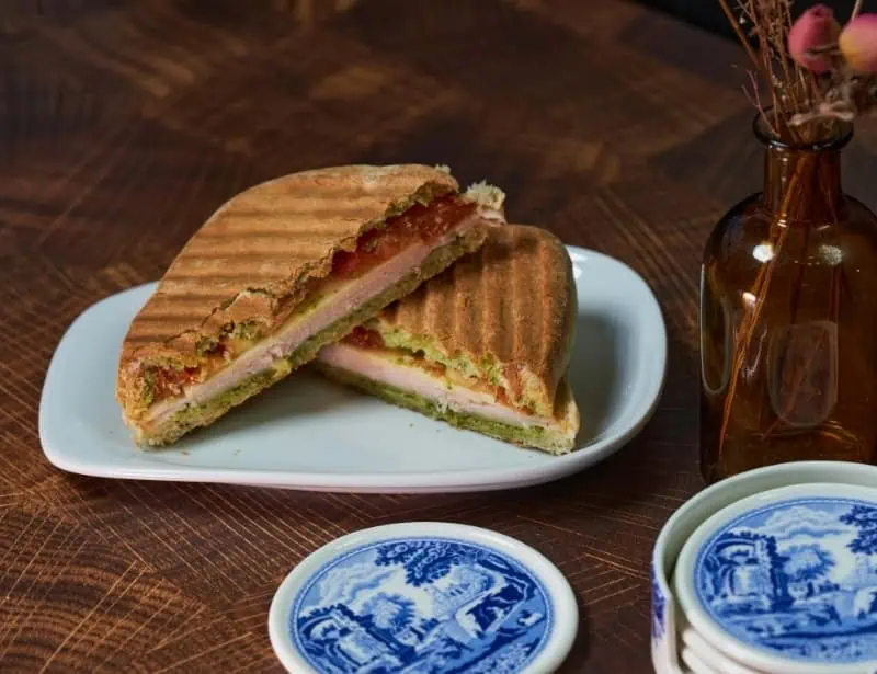 panini-pressed-sandwich-with-ham-cheese-and-pickles