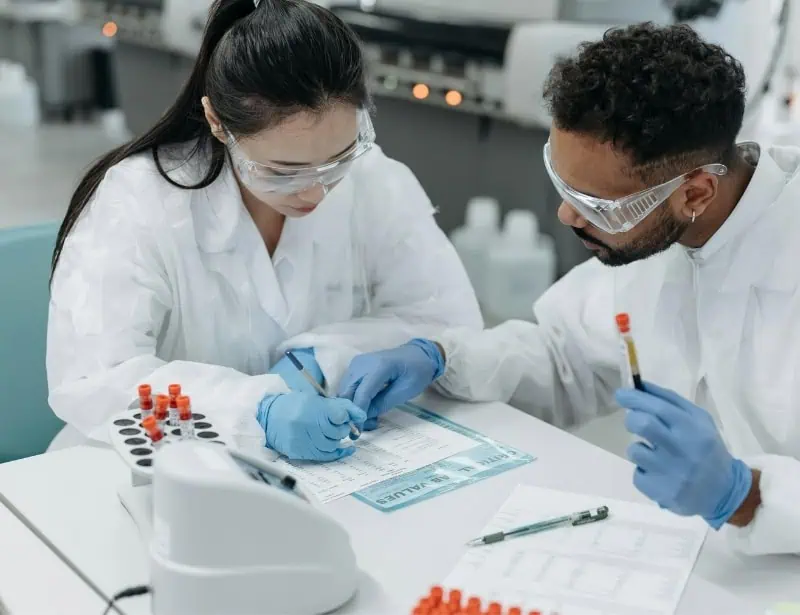 two medical researchers in lab