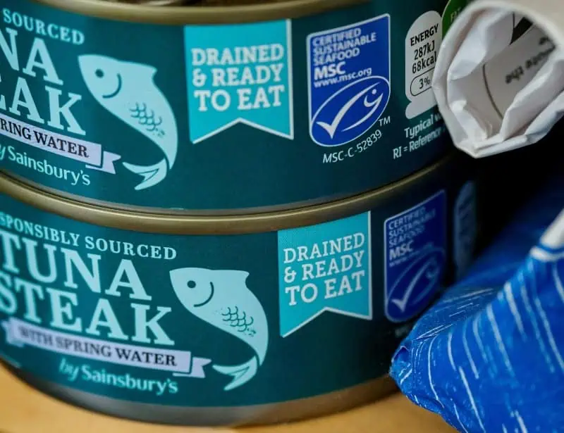 stacked two tuna steak cans with msc label