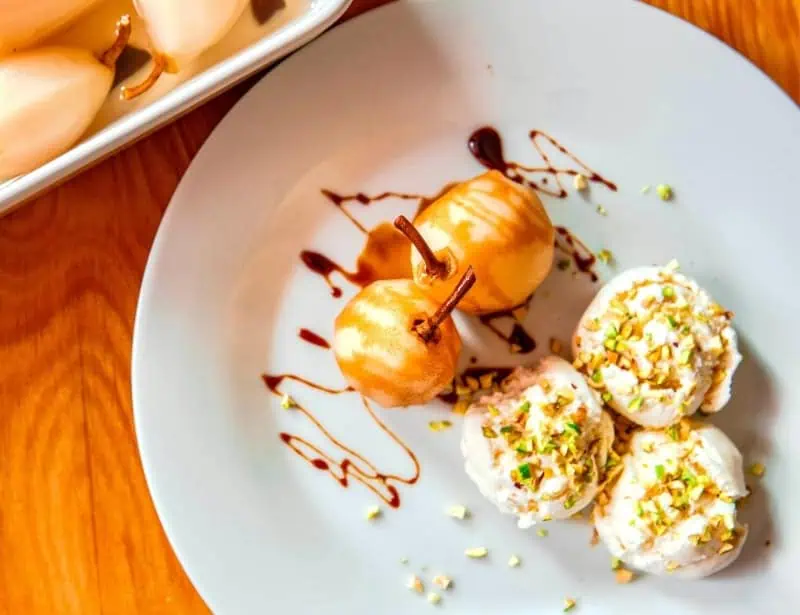 pears with chocolate sauce vanilla ice cream with pistachio
